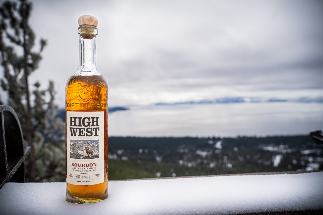 Brand Photography in Austin, Texas by Dispatch Tree Marketing - High West Whiskey Bourbon Bottle overlooking Lake Tahoe from high elevation.